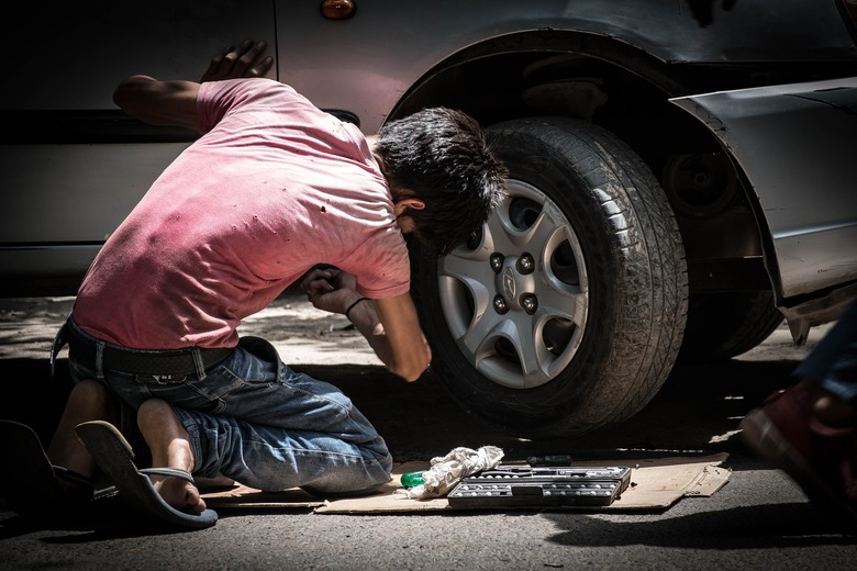 child labor in car mechanic shop